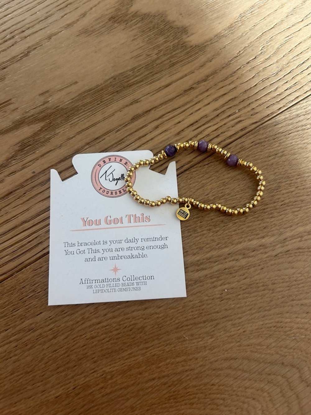 You Got This Gold Beaded Bracelet with Purple Gemstones